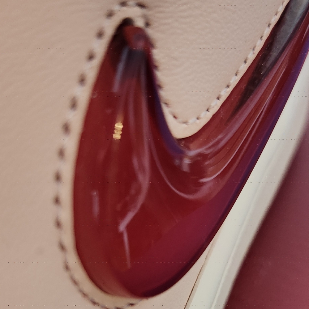 Air Jordan Pink/Fire Red Sneakers